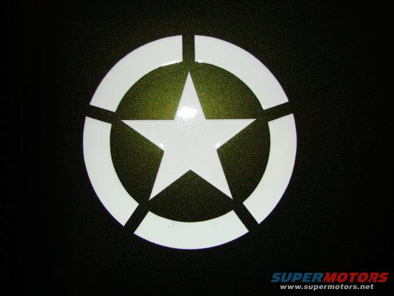 White military star emblem on a dark background