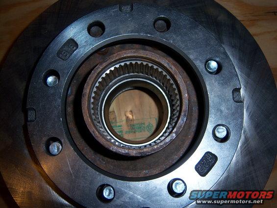 8 lug hub and brake rotor assembly with visible splines and bolt holes