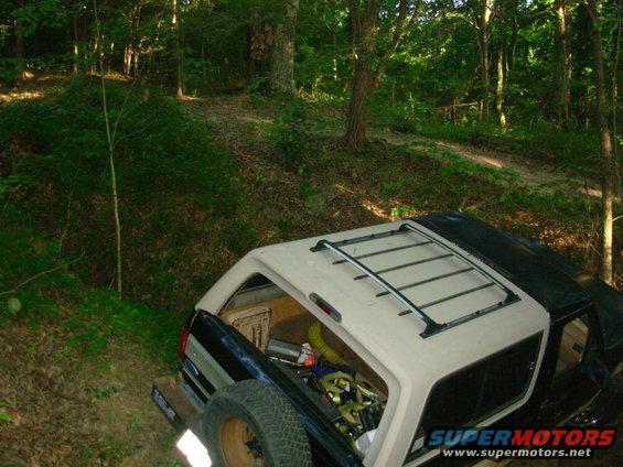 10061234hole.jpg Plowing dirt with the back bumper.