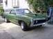 1970 Ford Ranchero - Green 1970 Ford Ranchero with hood scoop and side trim.