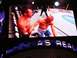1996 Ford Bronco - A UFC fight is shown on a large screen, with text 'AS REAL' visible at the bottom.