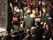 1996 Ford Bronco - A crowd watches as UFC fighters are prepared for a match, with camera operators and officials nearby.