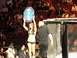 1996 Ford Bronco - A ring girl holds up a sign with the number 2 during a fight event.