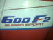1991 Honda CBR-RR - Close-up of a motorcycle fairing displaying '600 F2 SUPER SPORT' graphics.