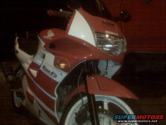 Red and white Honda 600 F2 motorcycle