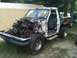 1988 Ford Bronco - This 1987 Ford truck is missing its front end and engine, revealing the interior and rear section.