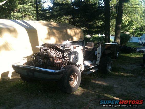 1988 Ford Bronco front view, engine exposed, partially disassembled