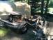 1988 Ford Bronco - Truck chassis and engine are disassembled and exposed in an outdoor setting.