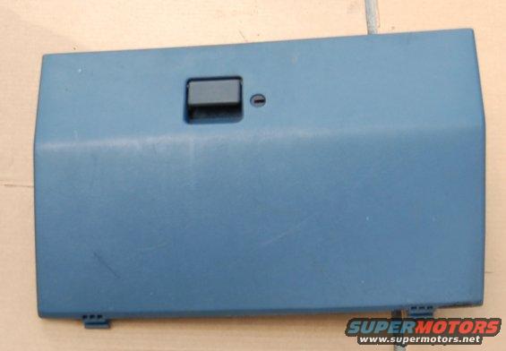 Blue glove box door with black latch