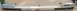 1988 Ford Bronco - A white rear bumper, likely from a truck or SUV, is shown laid flat on a cardboard surface.