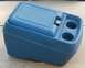 1988 Ford Bronco - This blue plastic center console features two cup holders and a lockable compartment.