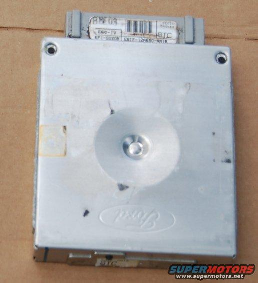 Ford EEC-IV engine control unit with part numbers visible