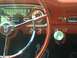 1972 Ford Ranchero - Interior view of a classic car's dashboard, a distinctive steering wheel and shift knob.