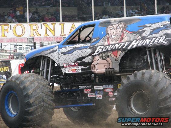 Monster truck side view with "Bounty Hunter" graphic