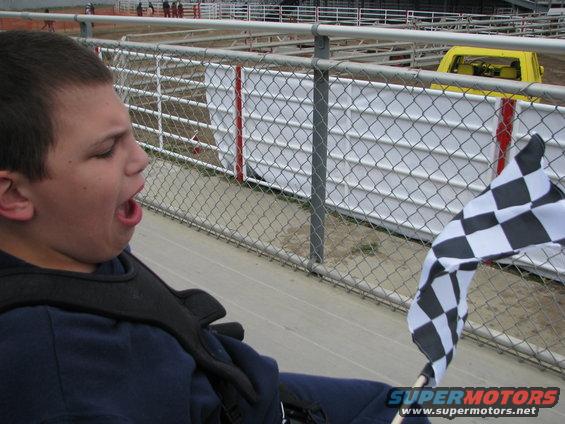 Joe enjoying MonsterJam and his flag!