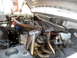 1996 Ford Bronco - Custom exhaust headers are visible in the engine bay, with the radiator coolant reservoir also in view.