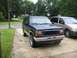 1991 Ford Explorer - This 1991 Ford Explorer is parked in a driveway next to another vehicle.