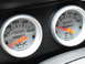 2003 Mercury Marauder - Two Auto Meter gauges, an oil pressure gauge and a battery voltage gauge, are shown in this close-up interior shot.