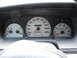 2003 Mercury Marauder - The instrument cluster for a Mercury Marauder shows the speedometer, tachometer, and fuel gauge.