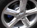 2003 Mercury Marauder - Chrome wheel with a blue brake caliper.