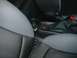 2003 Ford Crown Victoria - Close-up view of a car's interior, focusing on the center console and seating area.