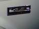 1995 Ford C-350 (Centurion Conversions) - Close-up of a C350 badge, likely from a Ford truck.