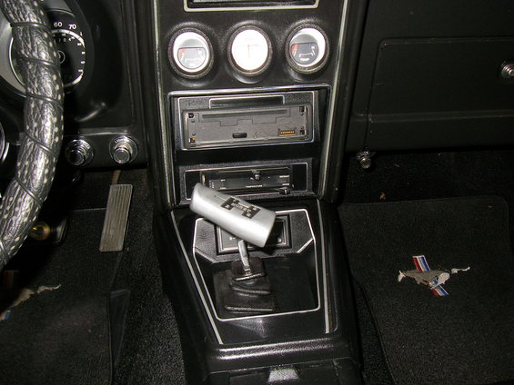 1971 Ford Mustang interior with floor mat pony emblem and shifter