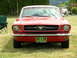 1965 Ford Mustang - Front view of a red 1965 Ford Mustang with an Oregon license plate.