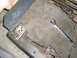 1996 Dodge 2500 - Car seat mechanism components and a wrench are visible on the carpeted floor.