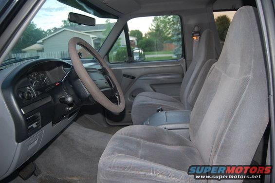 Interior view of a 1992 Ford F-Series truck showing the dashboard, steering wheel, and front seats