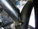 1989 Ford Escort - Welded tubing forms a roll cage structure within a vehicle's interior.