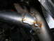1989 Ford Escort - Close-up view of welded metal tubing, showing signs of rust and discoloration.