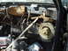 1989 Ford Escort - Interior view of a car dashboard with components removed, revealing the heater and blower assembly.
