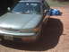 1994 Honda Accord - This 1994 Honda Accord is seen from the front 3/4 angle, showing its silver exterior.