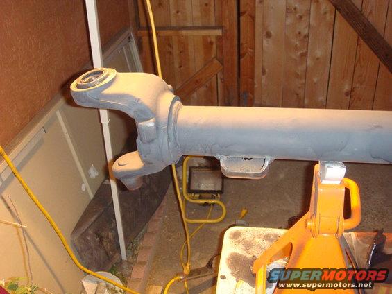 Driveshaft on jack stands, gray primer finish