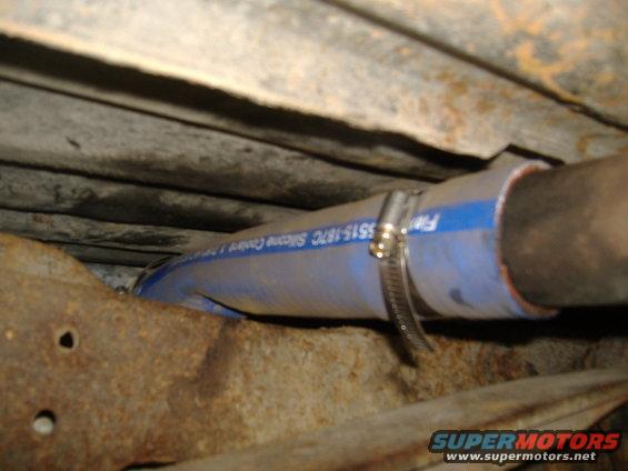 Blue silicone hose with clamp and text '5515-187C Silicone Cooler' visible