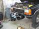 1991 Ford Explorer - Installing a winch on the front bumper of a 1991 Ford Explorer.