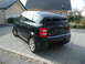 2001 Audi A4 - Rear view of a black Audi A2 hatchback parked on a tiled driveway.