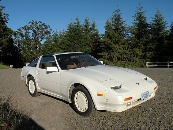 White 1989 Nissan 300ZX coupe with pop-up headlights parked outdoors