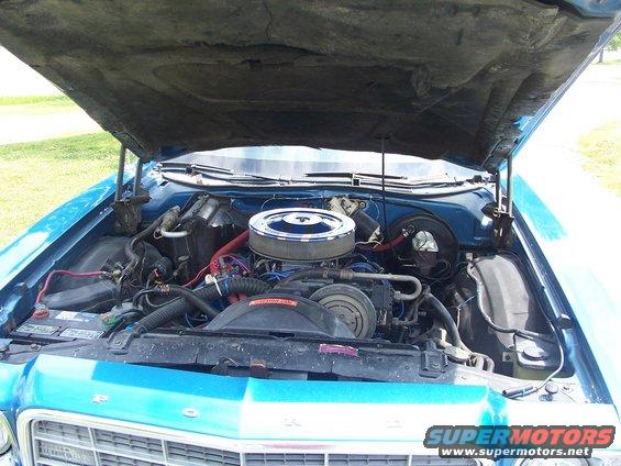 Blue 1973 Ford Ranchero engine bay with chrome air cleaner and visible V8 engine components