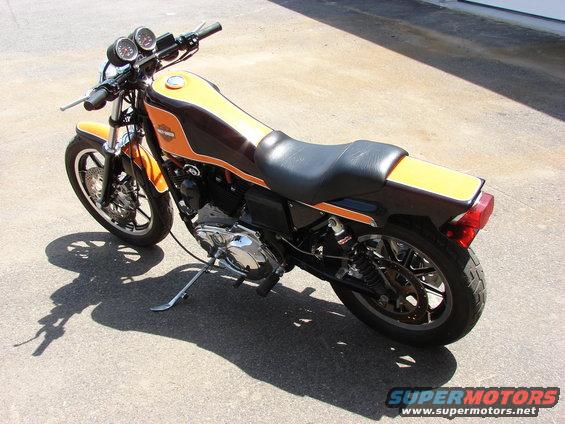 Orange and brown motorcycle, 3q-front view