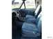 1990 Ford Bronco - Photo originally from seller... Small tears in driver's seat. Otherwise, interior is clean.