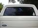 1990 Ford Bronco - Rear window stickers, showing support for the National Rifle Association, the University of Texas Longhorns, and all th…