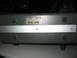 2002 Yamaha R1 - This electronic device has a silver band and ventilation slots on its rear panel.