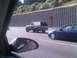 1986 Ford Bronco - A Ford Bronco from the 1980s is seen driving on a highway next to another car.