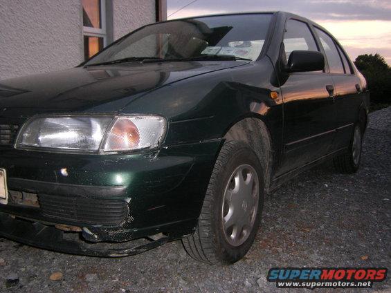 1998 Nissan Almera sedan, front passenger side view, parked outdoors
