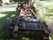 1989 Ford Bronco - This is a disassembled truck chassis with its engine and fuel tank visible.