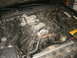 1998 Lincoln Mark VIII - Close-up view of a V8 engine bay, showing various mechanical components and wiring.