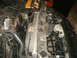 1998 Lincoln Mark VIII - Close-up view of a car's engine bay, showing various components and wiring.