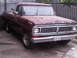 1986 Ford Bronco - This early 1970s Ford F-Series pickup truck has a prominent grille and Ford badging.